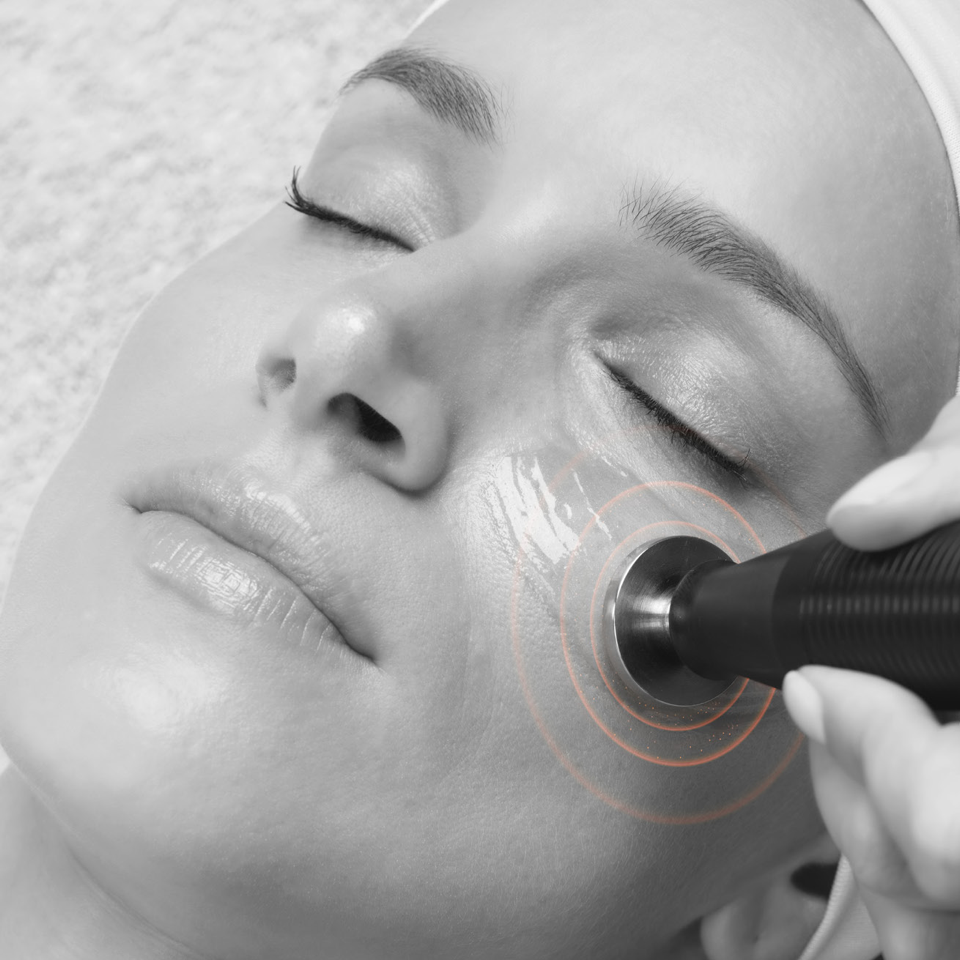 Woman having an Electrosonic Essential Treatment
